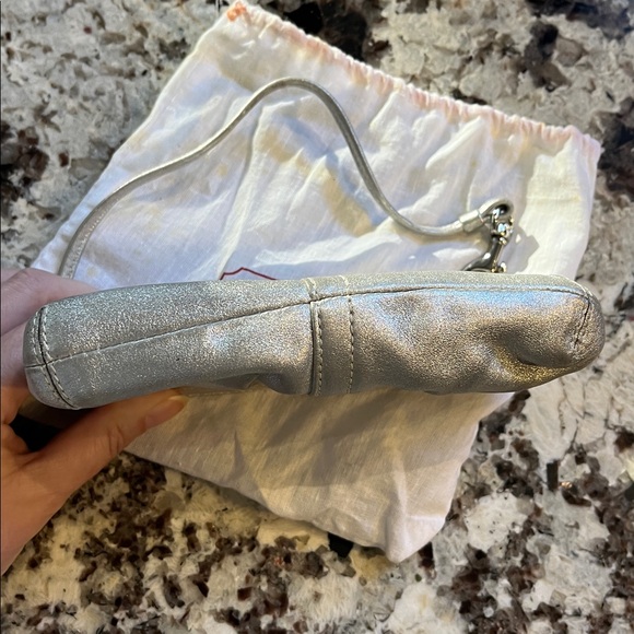 Coach Silver leather wristlet. Pre-Owned Condition-Very Good. - Picture 6 of 9
